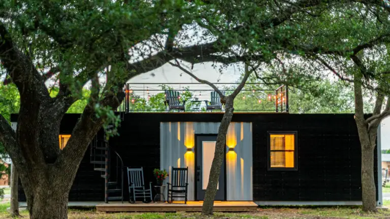 A modern container home located in the forest